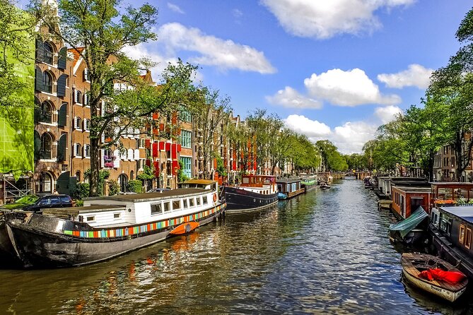 Amsterdam Day Trip from Brussels With Cheese, Clogs and Windmills - Dam Square and the old center