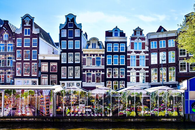 Amsterdam Day Trip from Brussels With Cheese, Clogs and Windmills - The canal cruise, lunch, and shopping choices