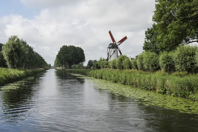 BikeTour Bruges & Damme in Spanish and English - Damme’s windmill, town hall, hospital, and church