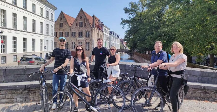 Bruges by bike with family and friends! - City walls, Kruispoort, and the Bruges windmills