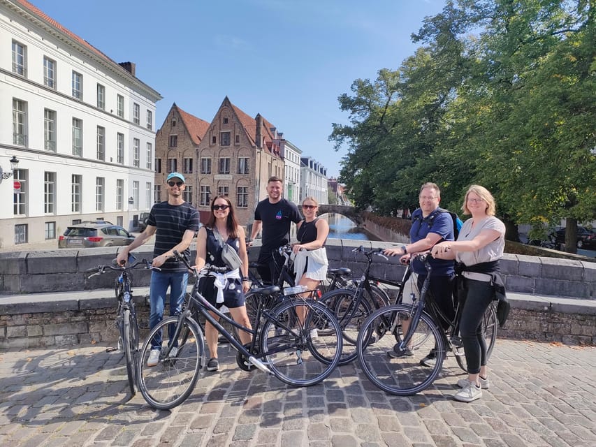 Bruges by bike with family and friends! - Market Square, Burg, and the central canals