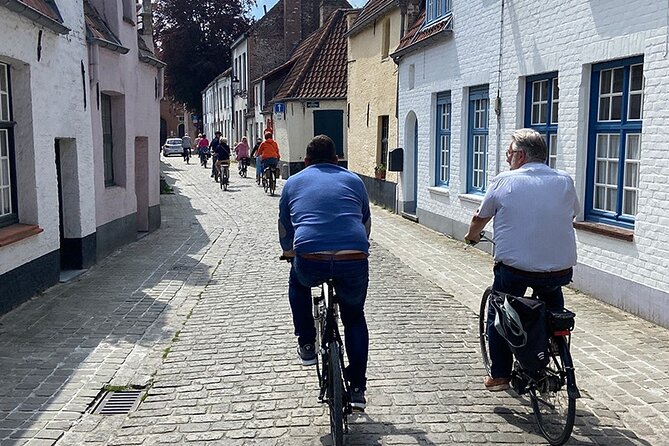 Bruges, Guided Retro Biketour: Highlights and Hidden Gems - Jan Van Eyckplein and the old canal approach