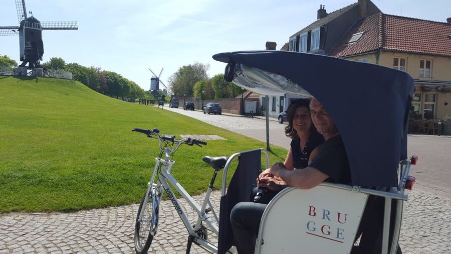 Bruges: Guided Rickshaw Tour - From famous sights to quieter streets