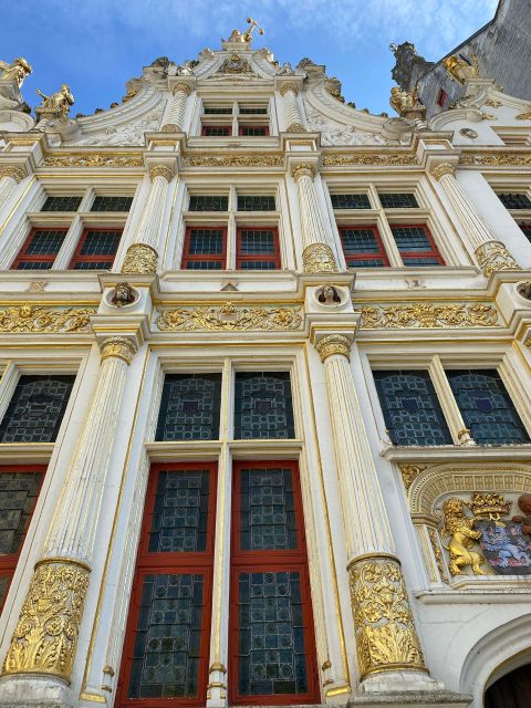 Bruges Guided Walking Tour: Stories, Mysteries and People - Narrow lanes, the Fish Market, and Huidenvettersplein