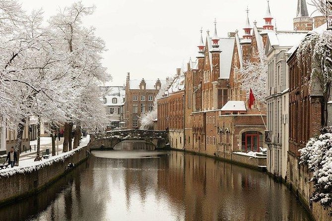 Bruges Uncovered: Historic Walking Tour & Canal Boat Experience - The center, museums, and canal-side views