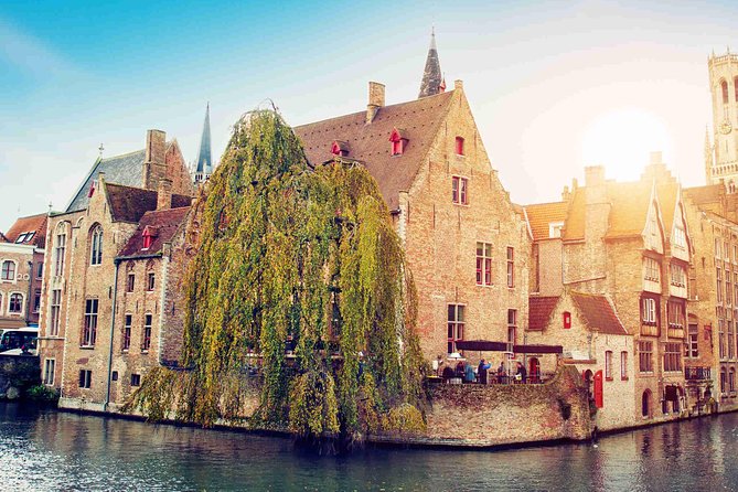 Bruges Uncovered: Historic Walking Tour & Canal Boat Experience - The Béguinage and Bruges’ quieter side
