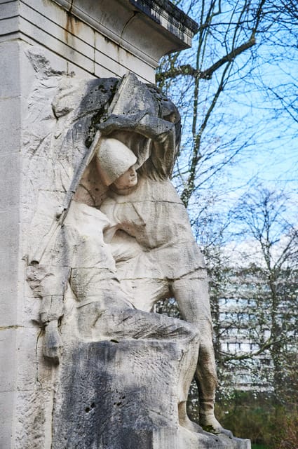 Brussels: Colonial Horrors of Leopold II in Congo Tour - Porte de Namur and the turn toward modern Brussels