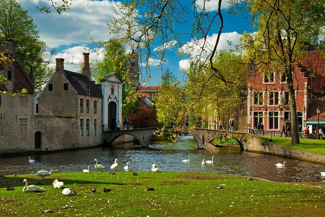 Excursion to Bruges and Ghent by bus from Brussels - Ghent opens with towers and a famous painting