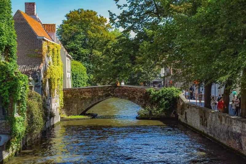 From Amsterdam: Private Sightseeing Tour to Bruges - Four hours among Bruges canals and cobbled streets