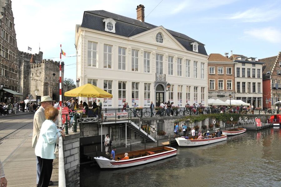 Ghent: 50-Minute Medieval Center Guided Boat Trip - Covered boats, open boats, rain, and winter cold