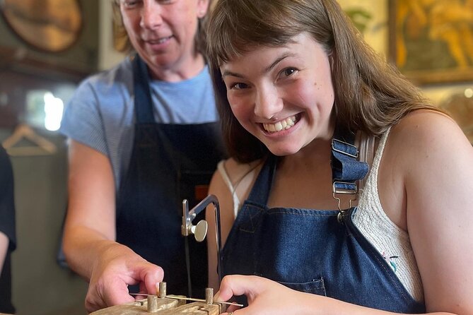 Handcraft your own silver ring in Bruges - Shaping the ring with a mallet and triblet