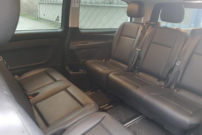 Luxury Minivan from Charleroi airport to the city of Ghent - Why the pickup point matters at Terminal 1