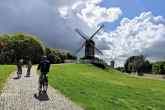 Private Bruges 3.5-Hour Guided Bike Tour: Discover Hidden Gems - City walls, Spanish merchants, and Jan van Eyck