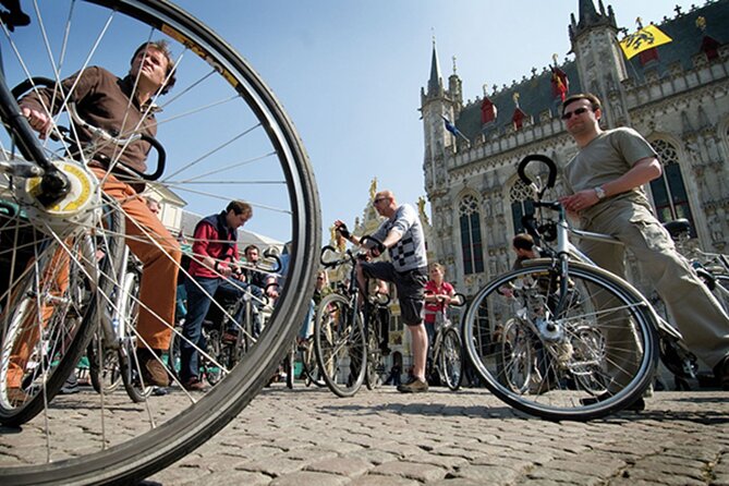 Private Bruges 3.5-Hour Guided Bike Tour: Discover Hidden Gems - Almshouses, ramparts, and the story beneath t Zand